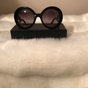 Prada 27NS Black Minimal-baroque round sunglasses